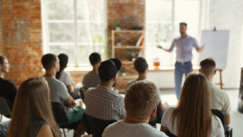 Adobe stock photo of a breakout session.